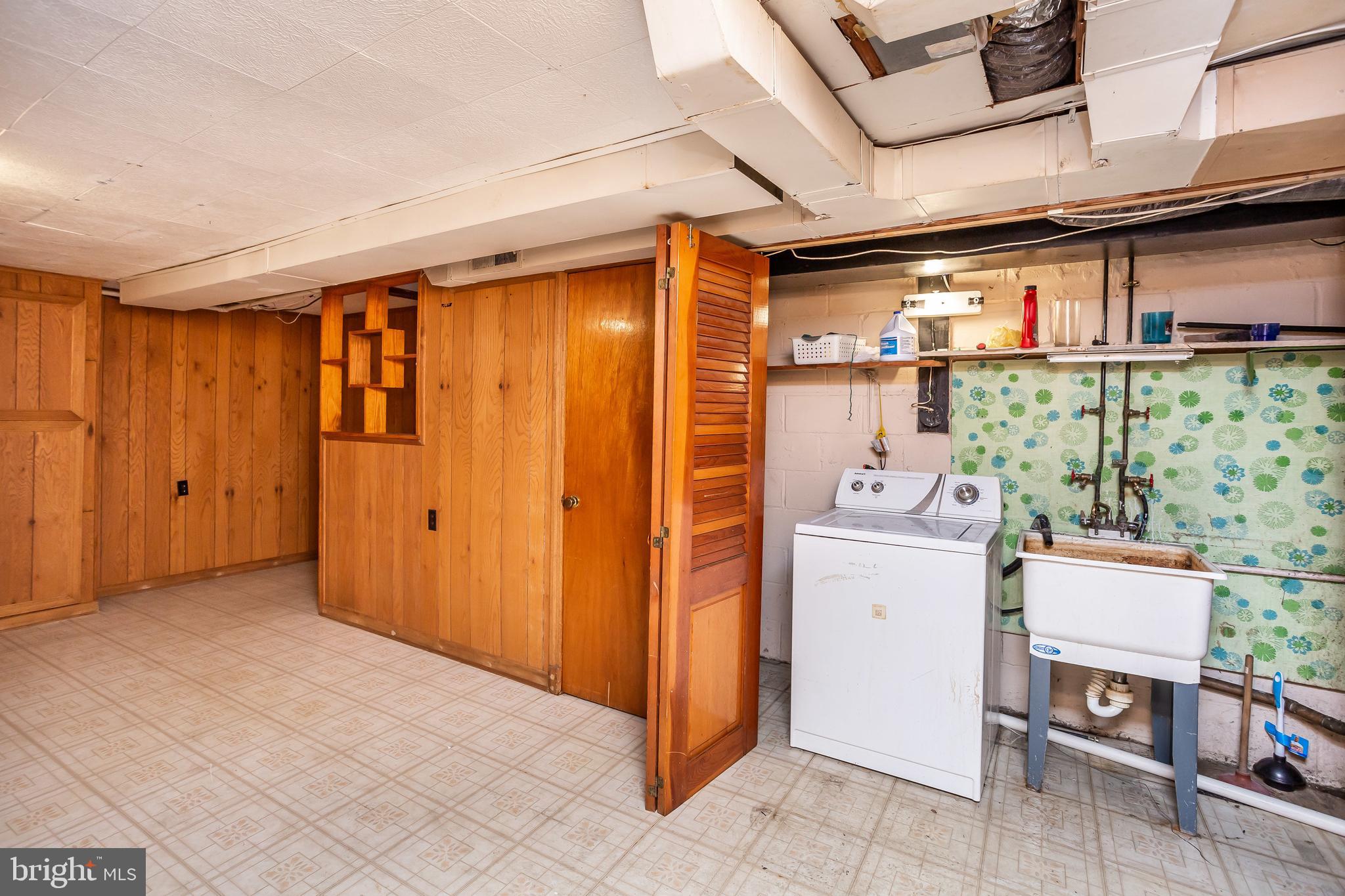 728 Aldworth Road Baltimore, MD 21222 - Photo 18 of 21 a room with storage and utility