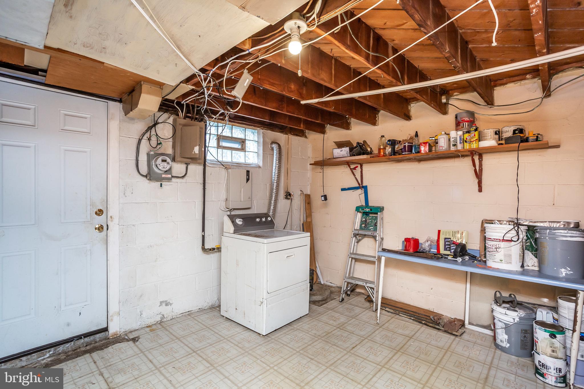 728 Aldworth Road Baltimore, MD 21222 - Photo 19 of 21 a utility room with dryer and washer