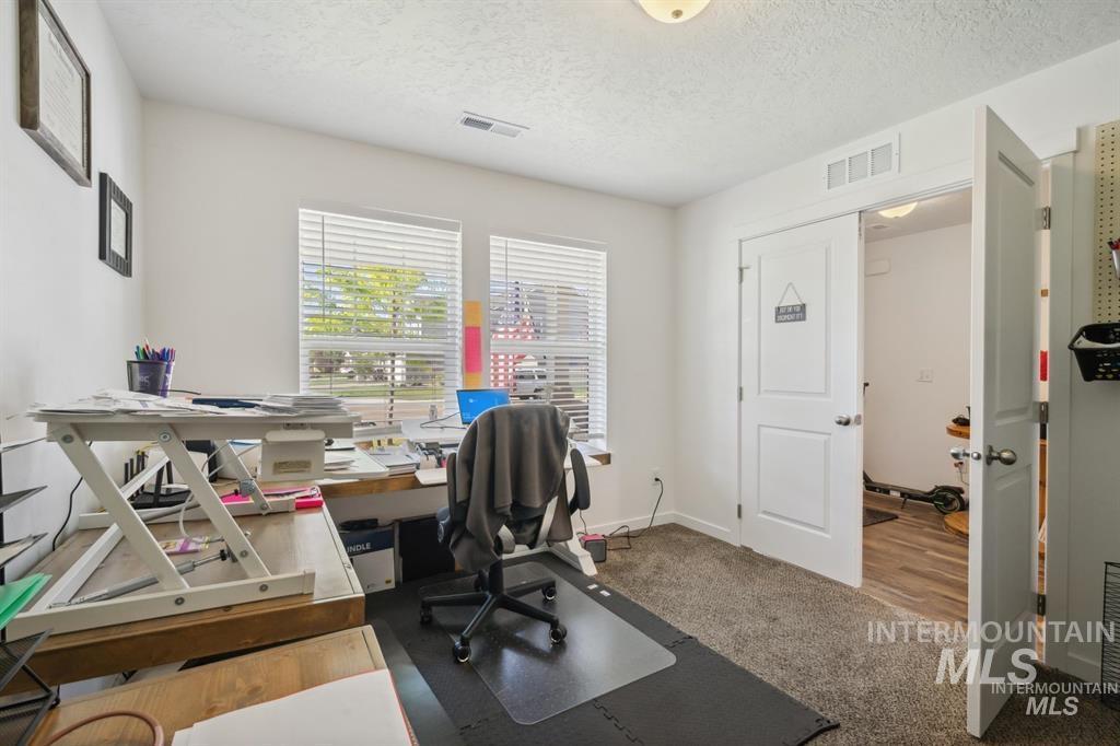 12656 Brun Street Caldwell, ID 83607 - Photo 26 of 39 Office featuring light carpet and a textured ceiling