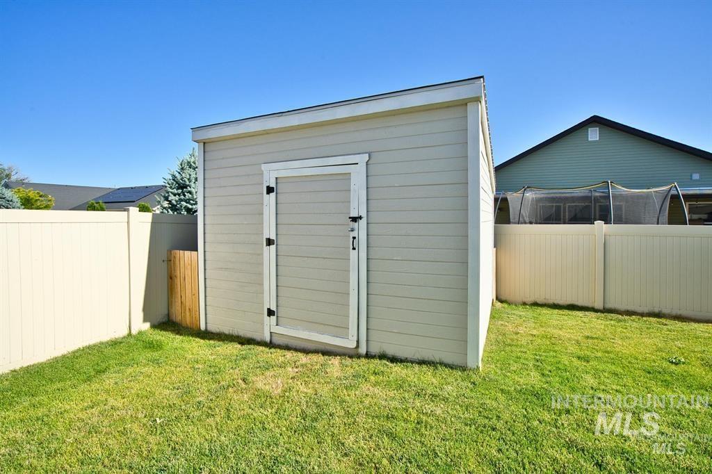 12656 Brun Street Caldwell, ID 83607 - Photo 33 of 39 View of shed featuring a fenced backyard