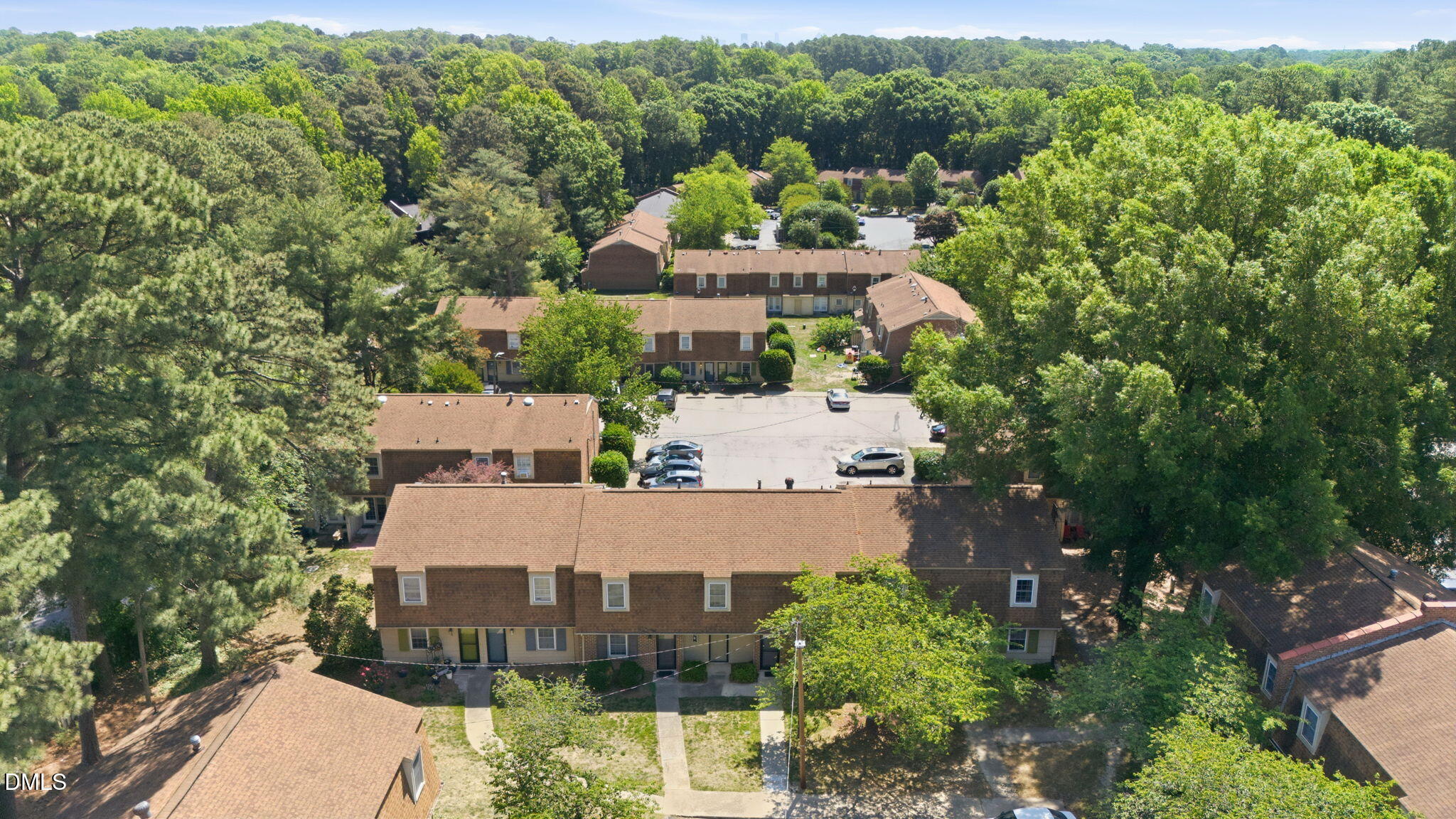 145 Jones Franklin Road, Unit D Raleigh, NC 27606 - Photo 21 of 23 an aerial view of a house