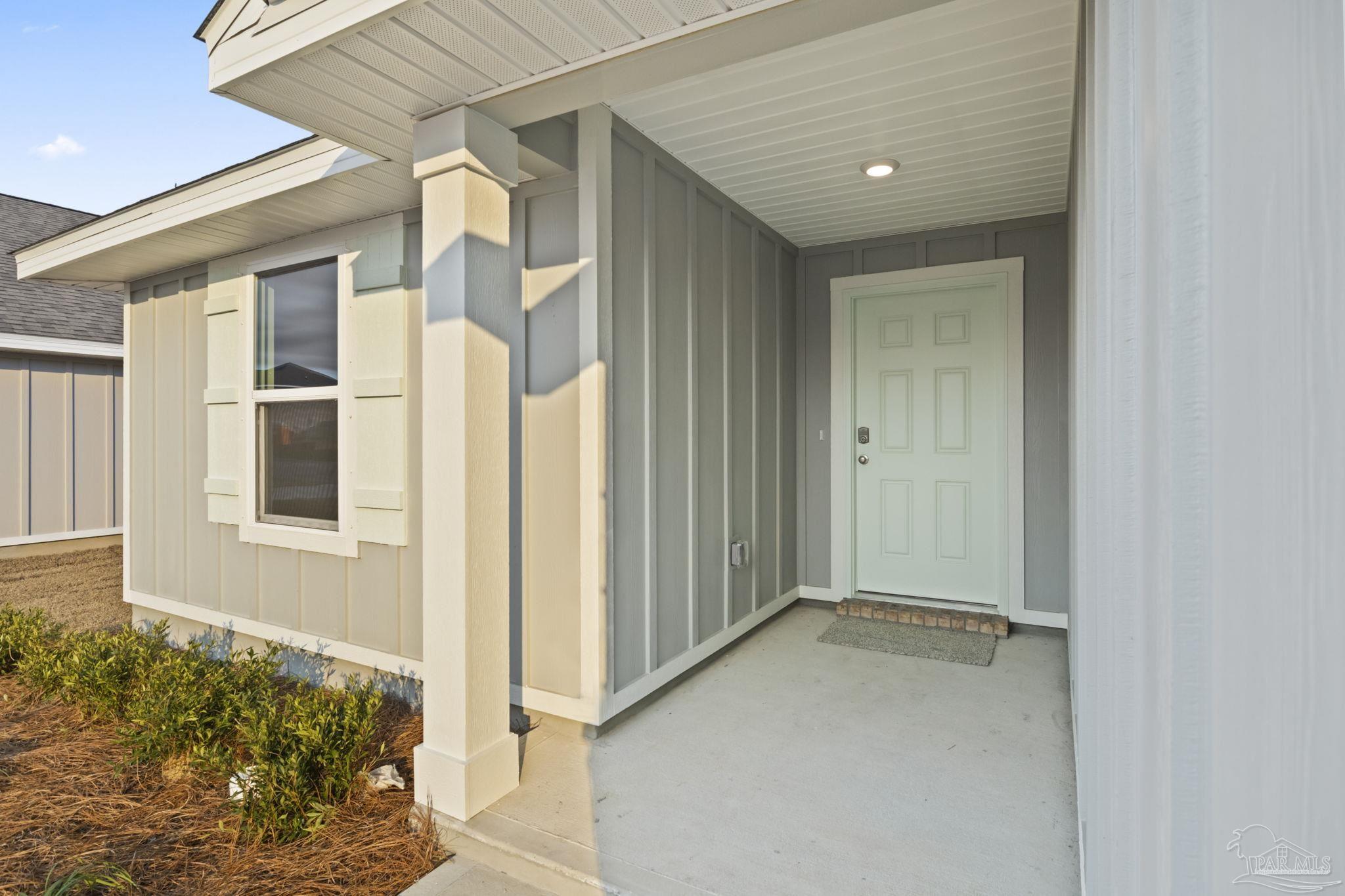2049 Limpkin Street Cantonment, FL 32533 - Photo 2 of 33 front view of a house