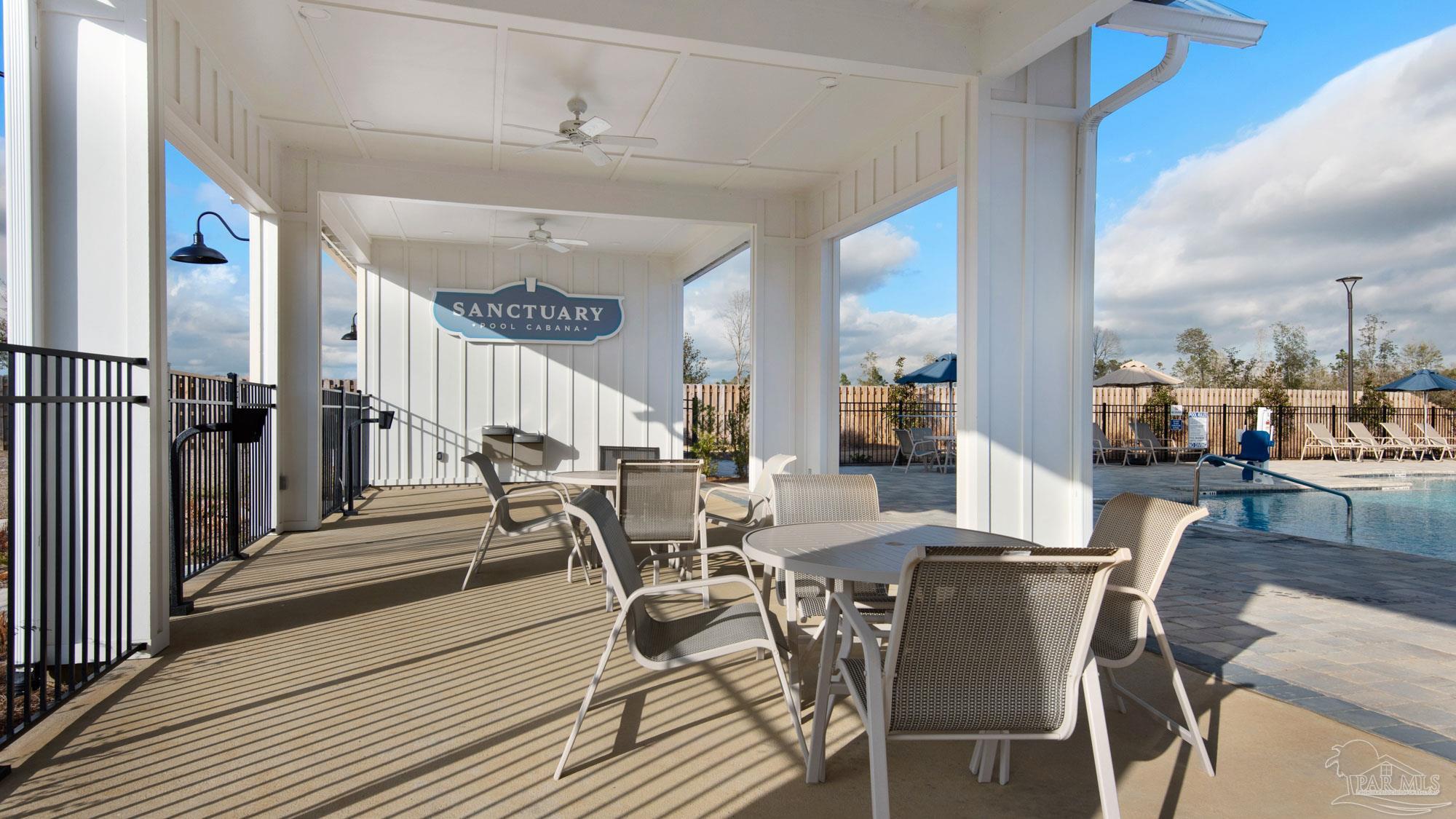 2049 Limpkin Street Cantonment, FL 32533 - Photo 28 of 33 a view of a dining room with furniture