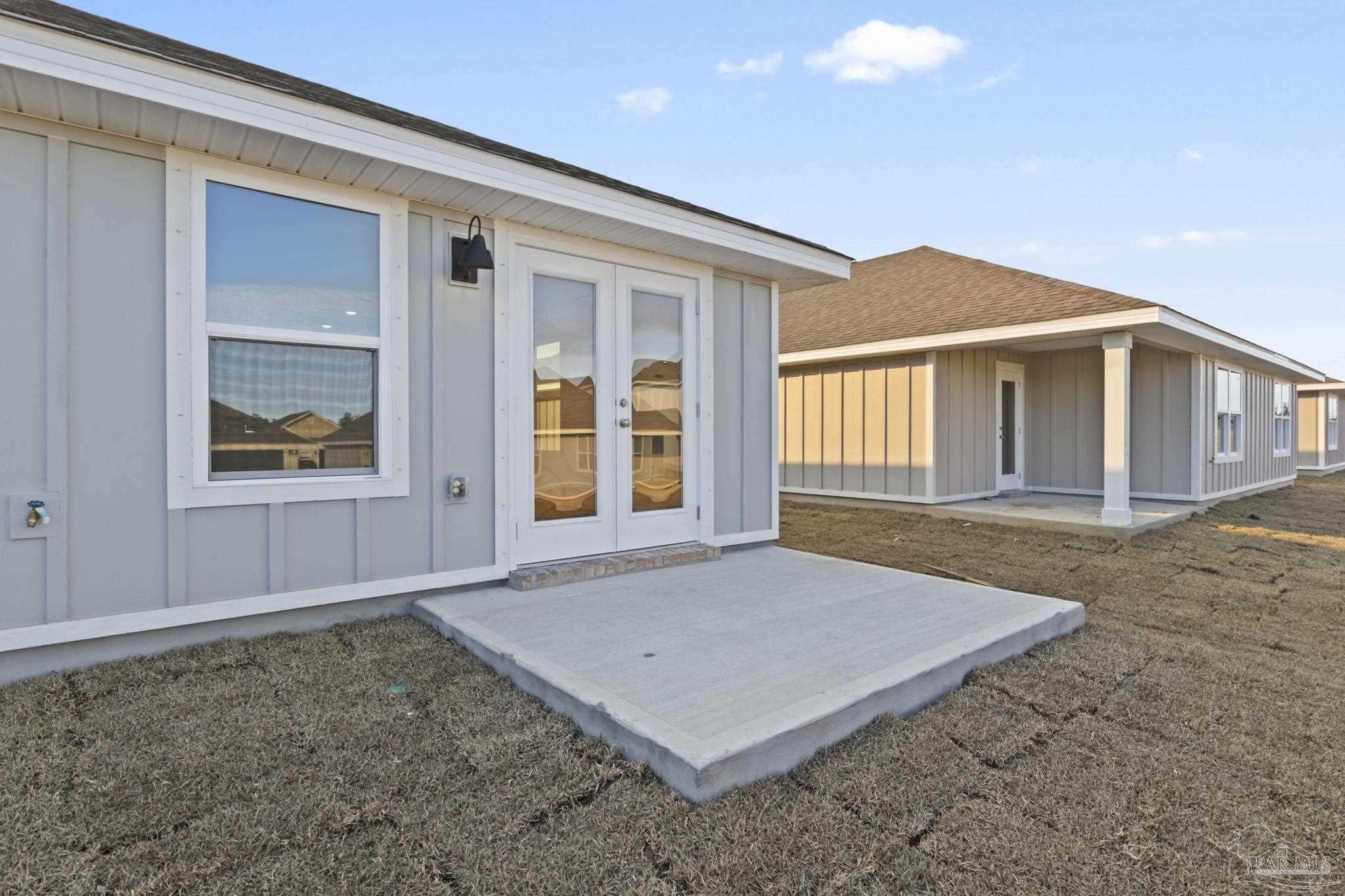 2049 Limpkin Street Cantonment, FL 32533 - Photo 31 of 33 an outdoor space with porch