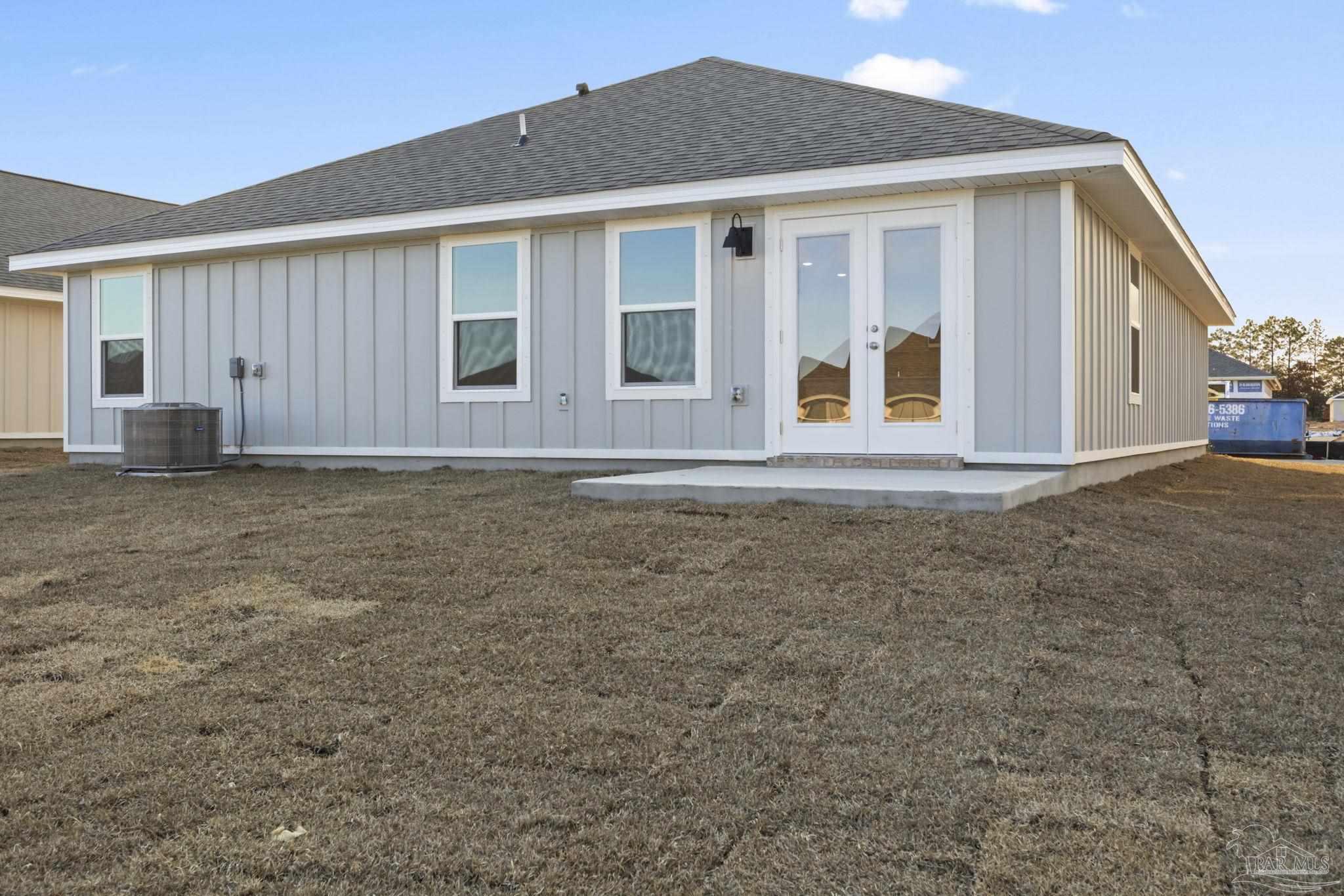 2049 Limpkin Street Cantonment, FL 32533 - Photo 33 of 33 a view of house with backyard