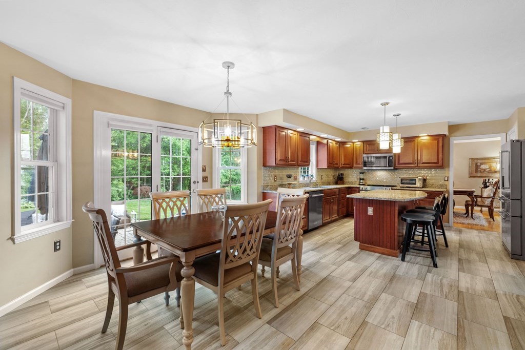 17 Amherst Road Shrewsbury, MA 01545 - Photo 14 of 42 a view of a dining room with furniture window and wooden floor