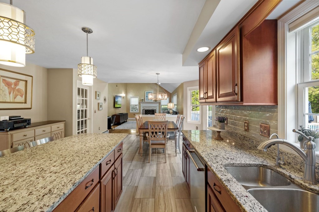 17 Amherst Road Shrewsbury, MA 01545 - Photo 15 of 42 a kitchen with granite countertop lots of counter top space and stainless steel appliances