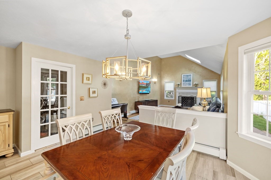 17 Amherst Road Shrewsbury, MA 01545 - Photo 16 of 42 a living room with fireplace furniture and a wooden floor