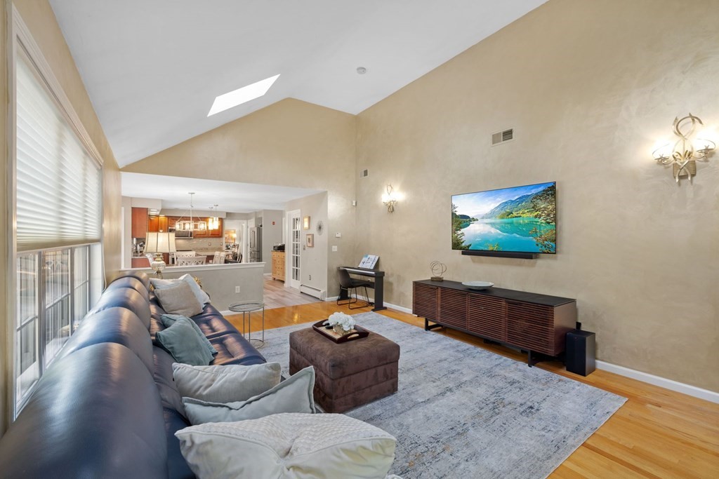 17 Amherst Road Shrewsbury, MA 01545 - Photo 19 of 42 a living room with furniture and a flat screen tv