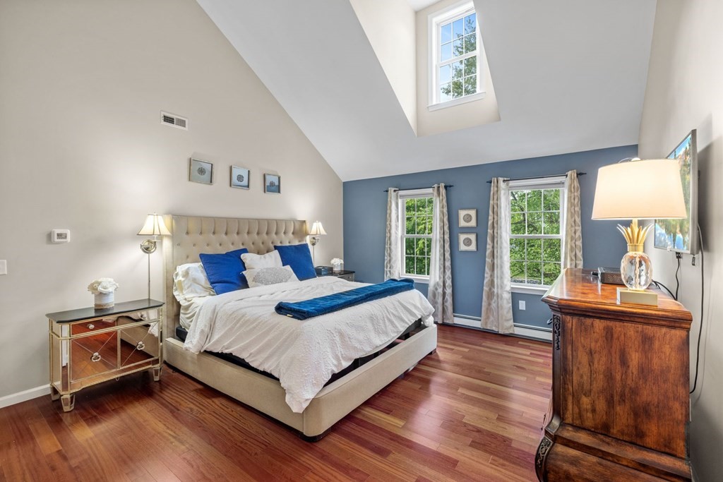 17 Amherst Road Shrewsbury, MA 01545 - Photo 20 of 42 a bedroom with a bed and a table