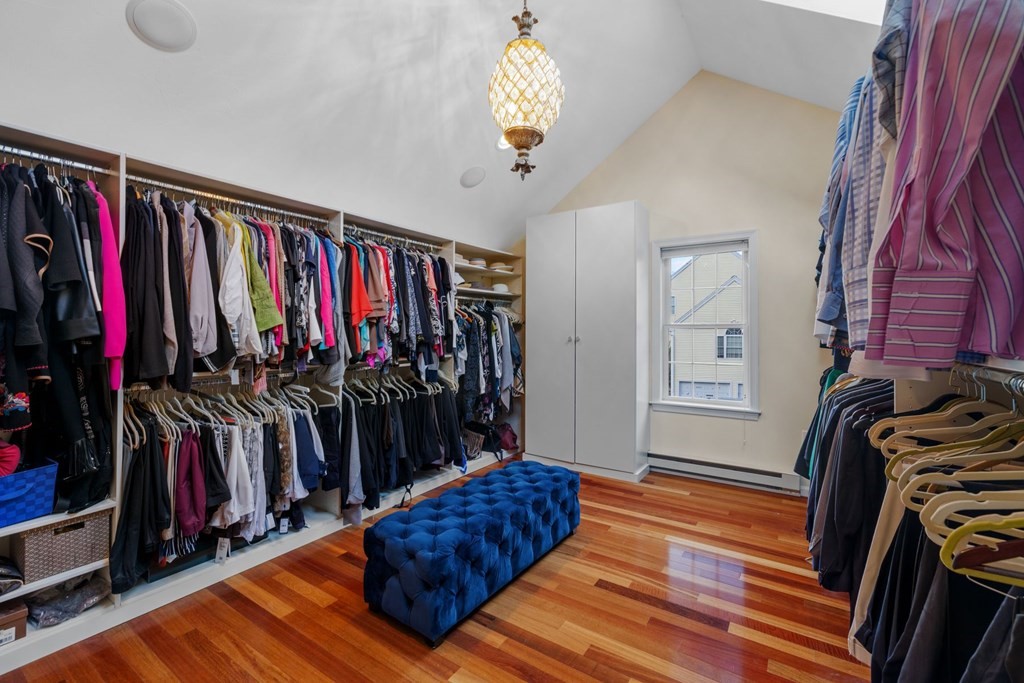 17 Amherst Road Shrewsbury, MA 01545 - Photo 23 of 42 a view of a living room with clothes and shoes