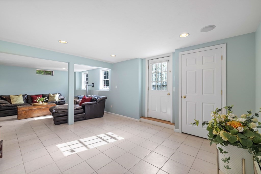 17 Amherst Road Shrewsbury, MA 01545 - Photo 30 of 42 a living room with furniture and flowers