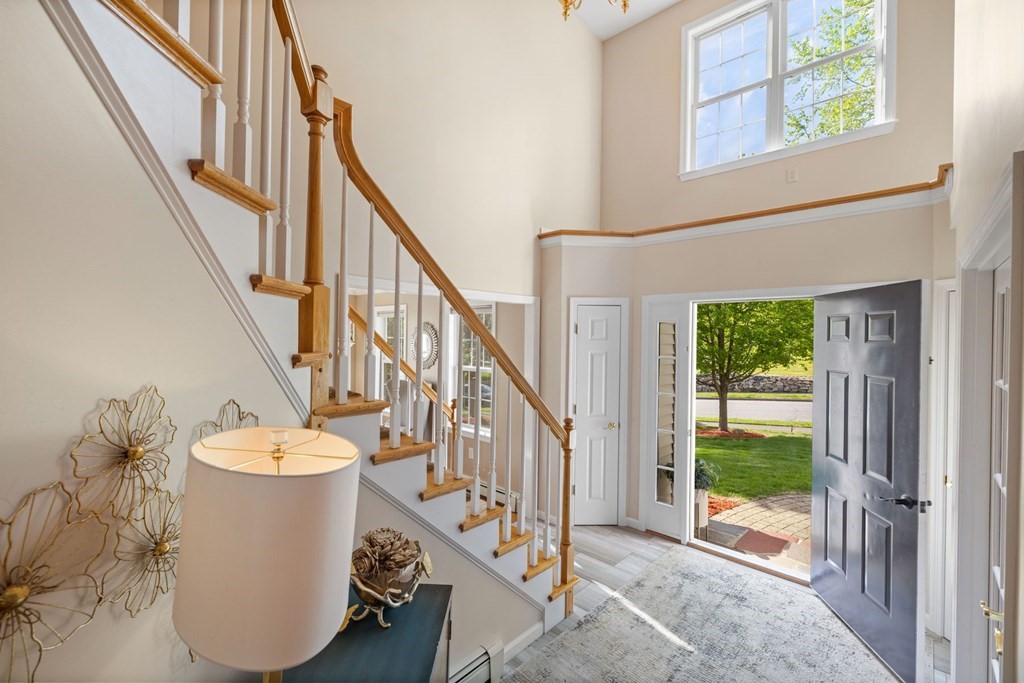 17 Amherst Road Shrewsbury, MA 01545 - Photo 3 of 42 a view of a hallway with windows and stairs