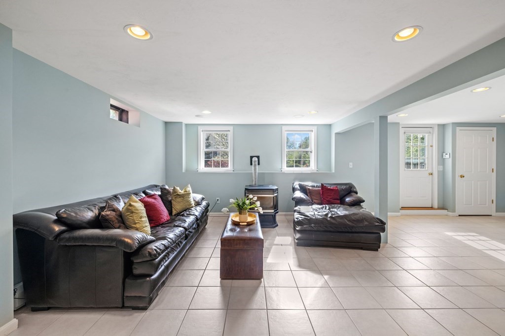 17 Amherst Road Shrewsbury, MA 01545 - Photo 31 of 42 a living room with furniture and a couch