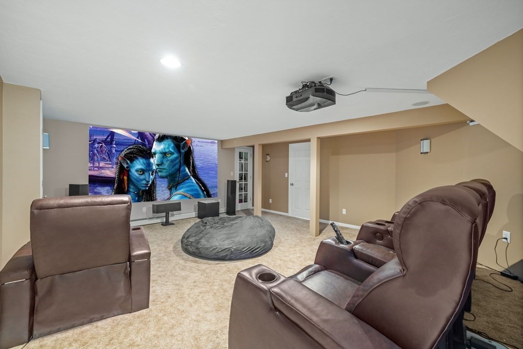 17 Amherst Road Shrewsbury, MA 01545 - Photo 33 of 42 a living room with furniture and a table