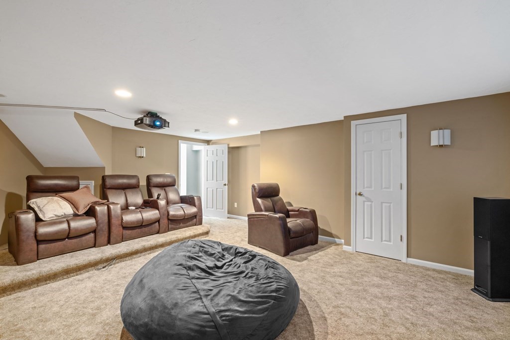 17 Amherst Road Shrewsbury, MA 01545 - Photo 34 of 42 a spacious bedroom with a bed a couch and dresser