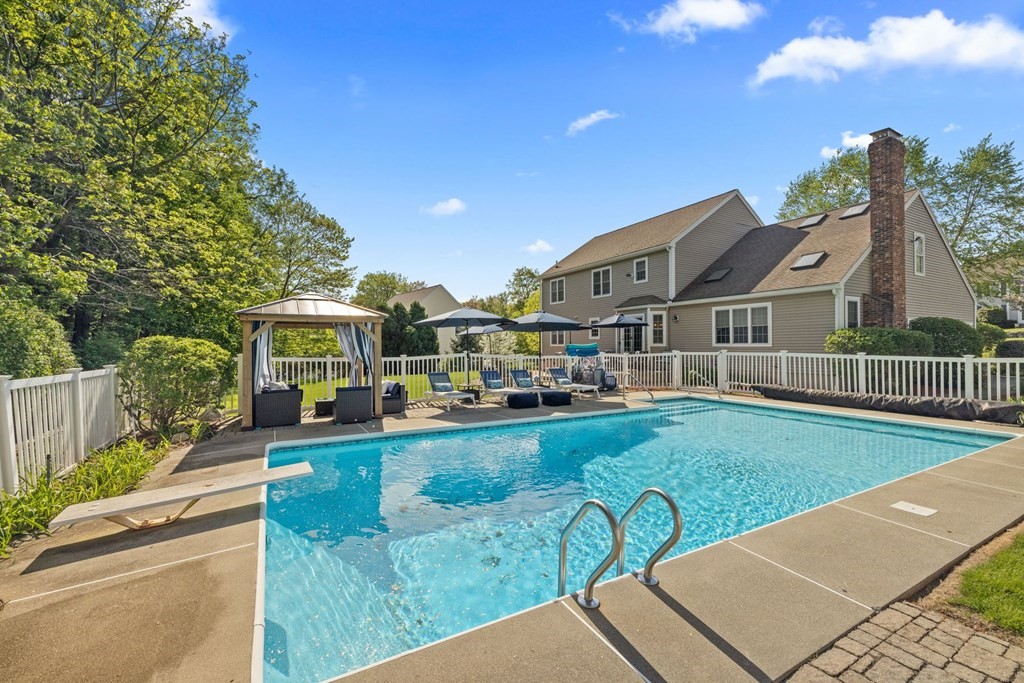 17 Amherst Road Shrewsbury, MA 01545 - Photo 37 of 42 a view of a house with backyard porch and sitting area