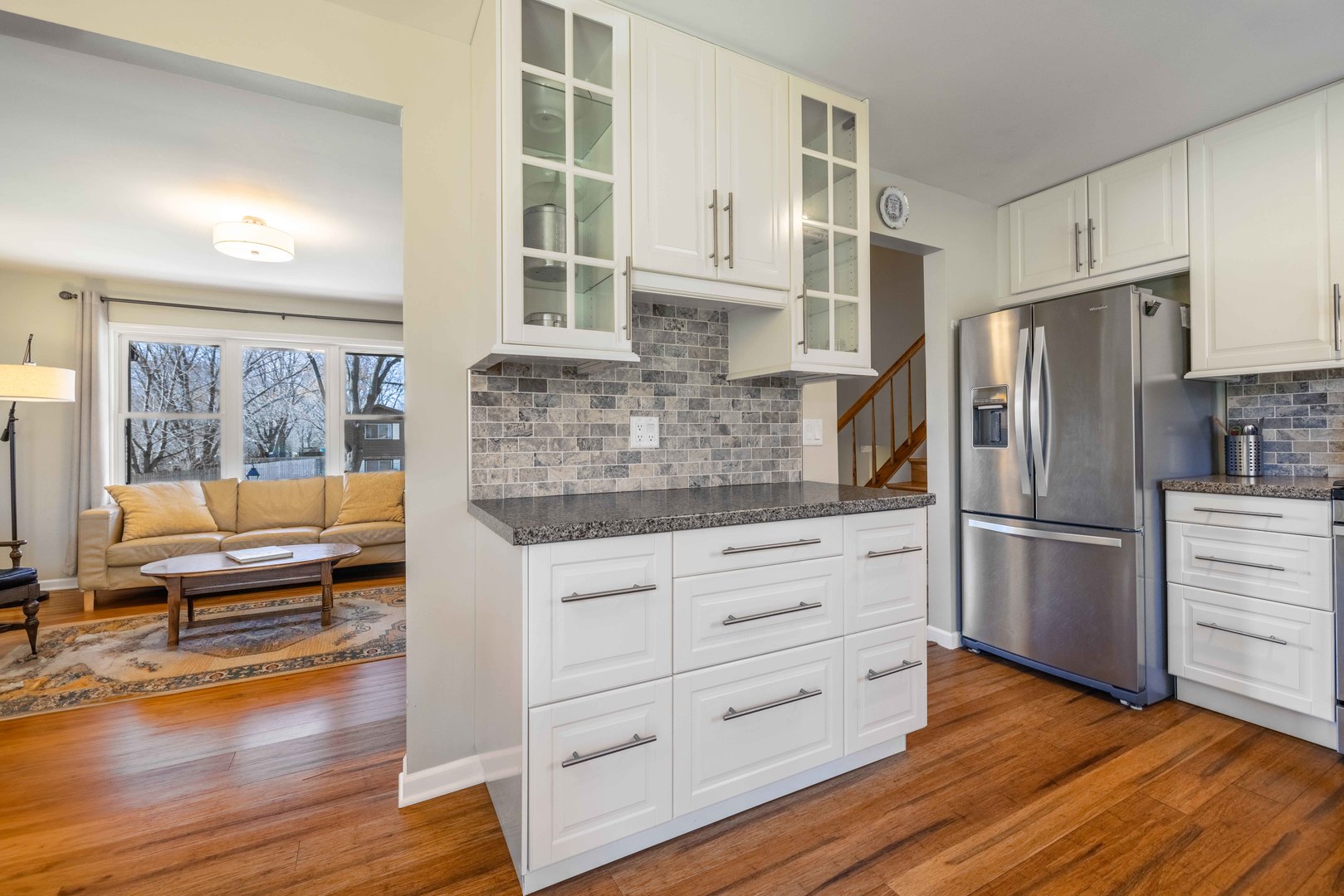 619 Scott Street Algonquin, IL 60102 - Photo 13 of 48 a kitchen with stainless steel appliances granite countertop a refrigerator and wooden cabinets