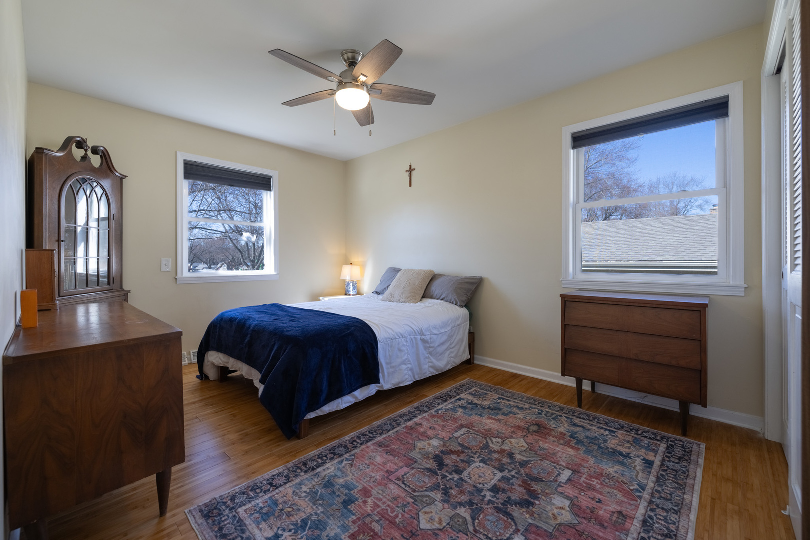 619 Scott Street Algonquin, IL 60102 - Photo 19 of 48 a bedroom with a bed dresser and wooden floor