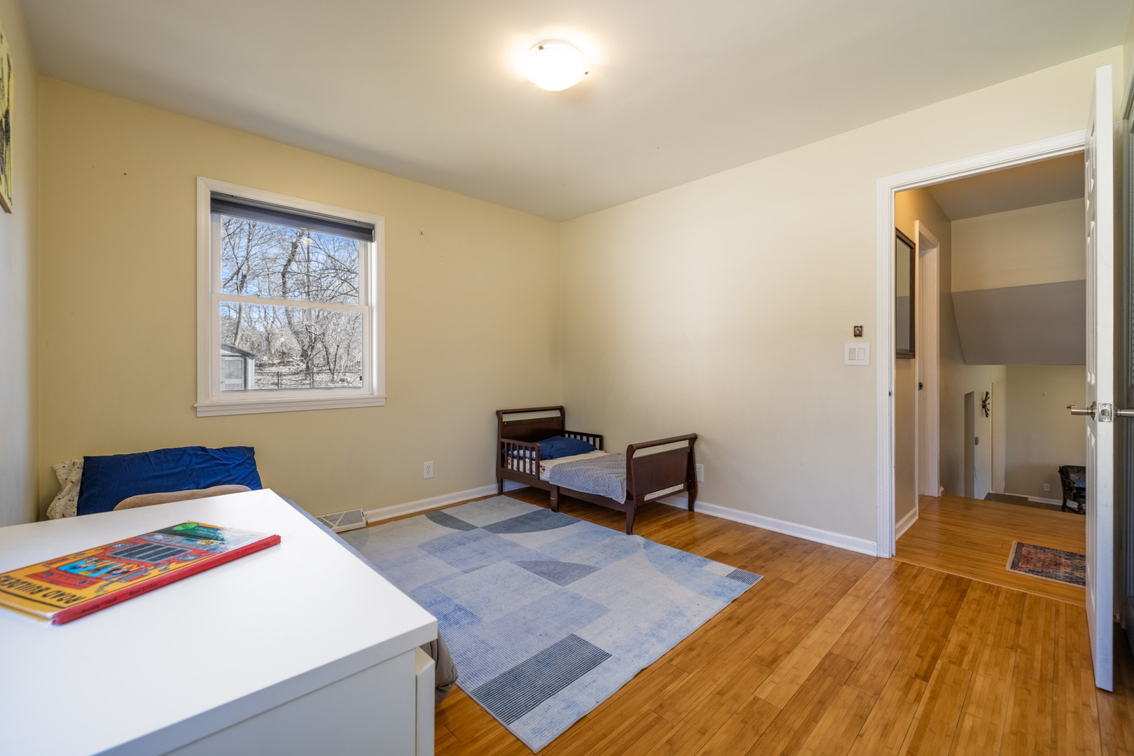 619 Scott Street Algonquin, IL 60102 - Photo 22 of 48 a bedroom with a bed and a table in it