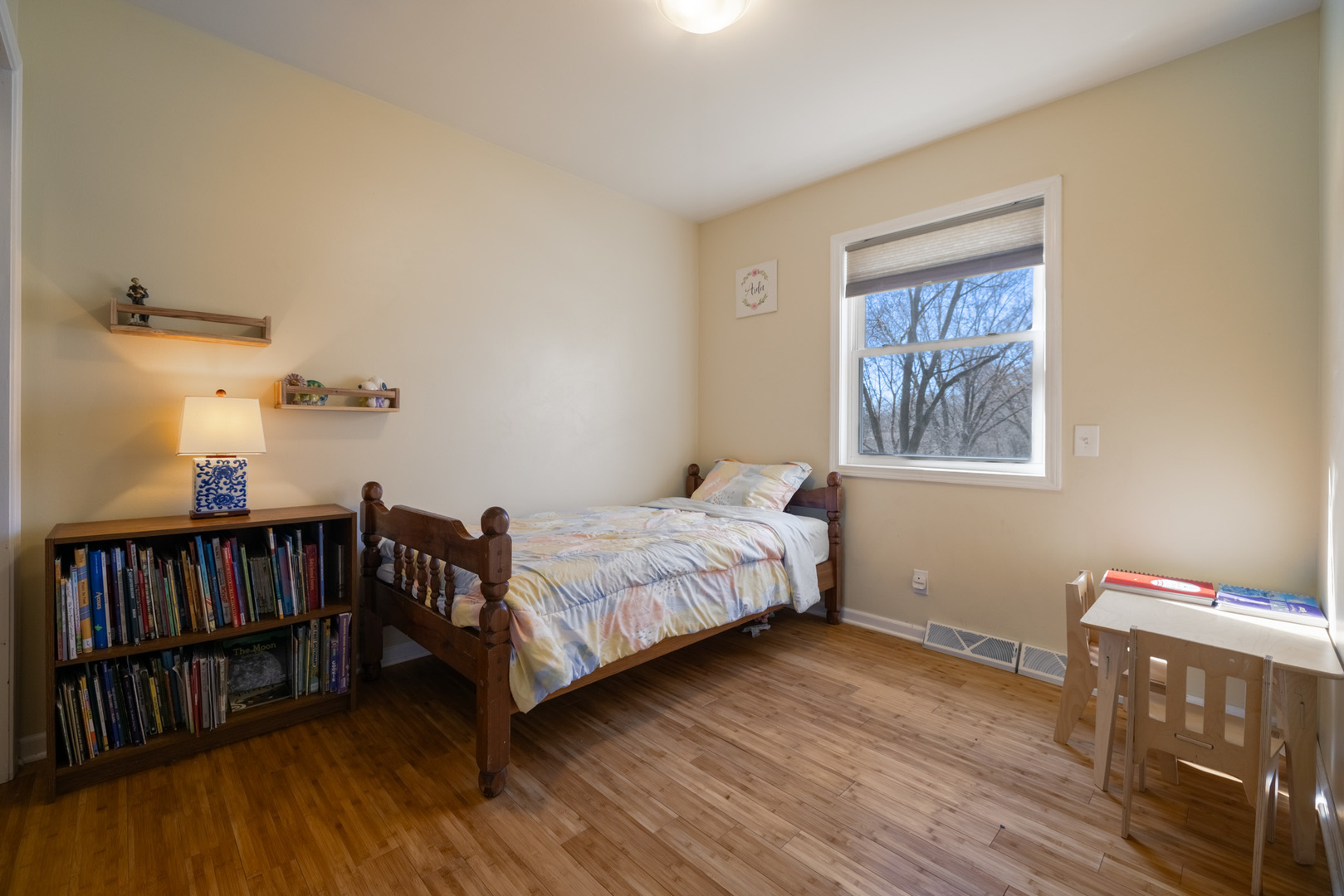 619 Scott Street Algonquin, IL 60102 - Photo 23 of 48 a bedroom with a bed and wooden floor