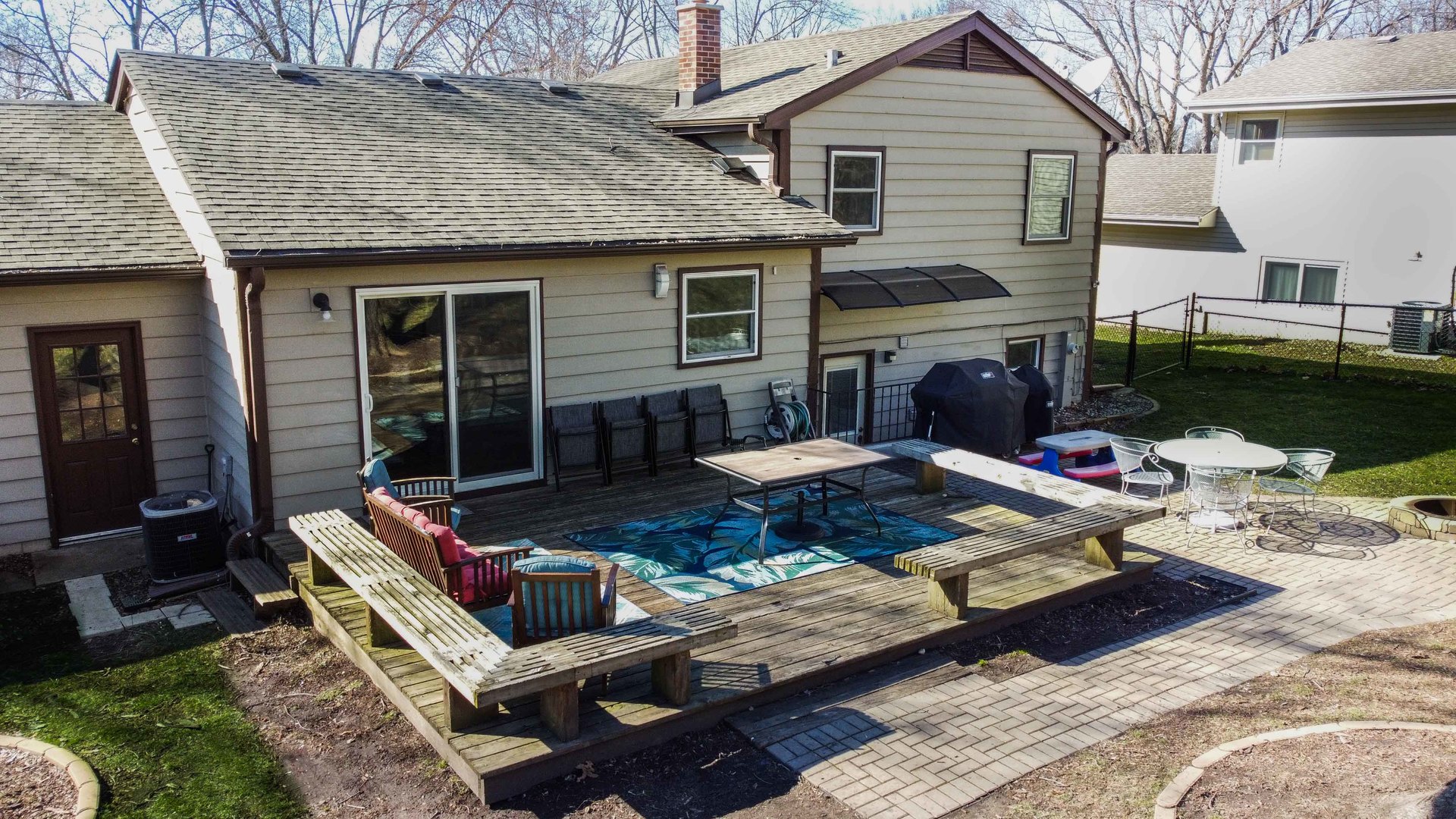 619 Scott Street Algonquin, IL 60102 - Photo 37 of 48 a view of a patio with couches chairs and a table