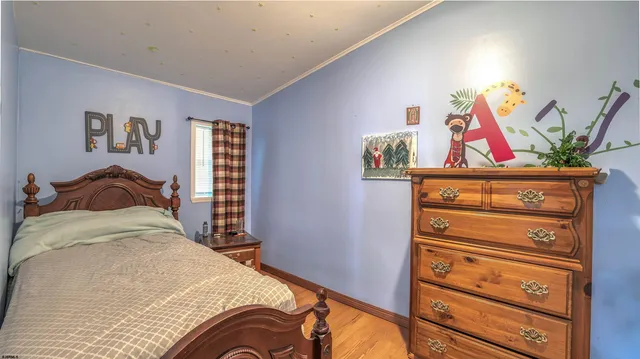 a bedroom with a bed and furniture