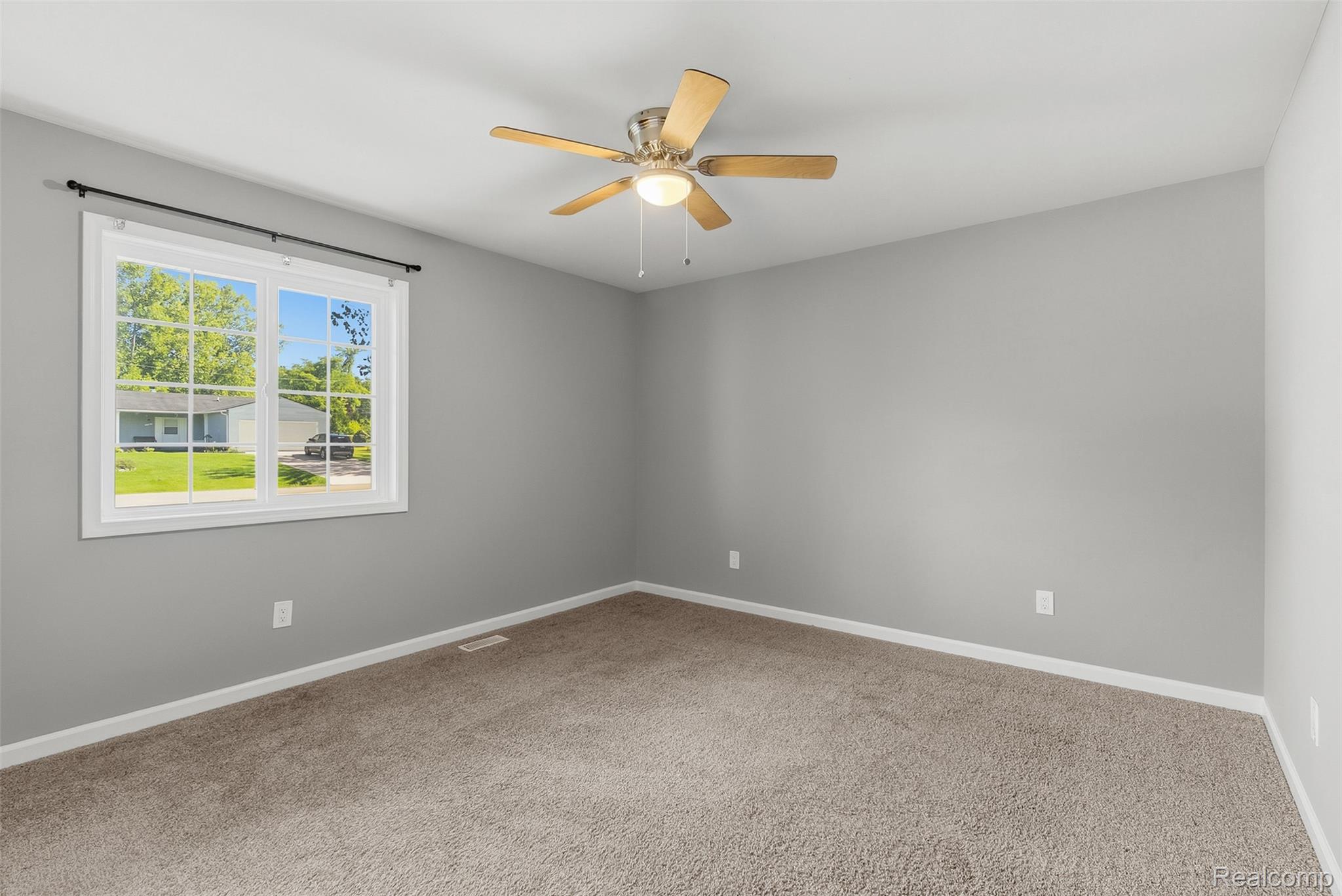 1750 Henbert Road West Bloomfield, MI 48324 - Photo 16 of 32 Recessed lighting, ceiling fan with light fixture, neutral gray wall paint, white-trimmed window, and brown carpet flooring