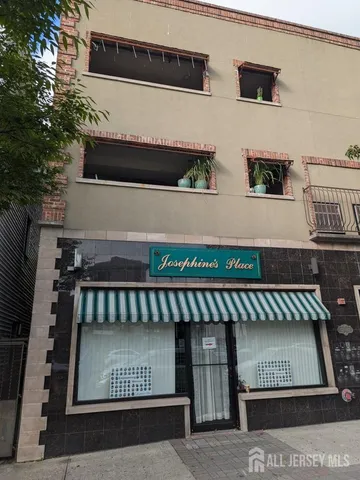 a view of a house with a street