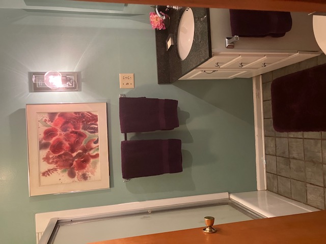 2066 Tolbert Road Hamilton, OH 45011 - Photo 25 of 63 This bathroom features a sleek vanity and a tiled shower for a functional space.