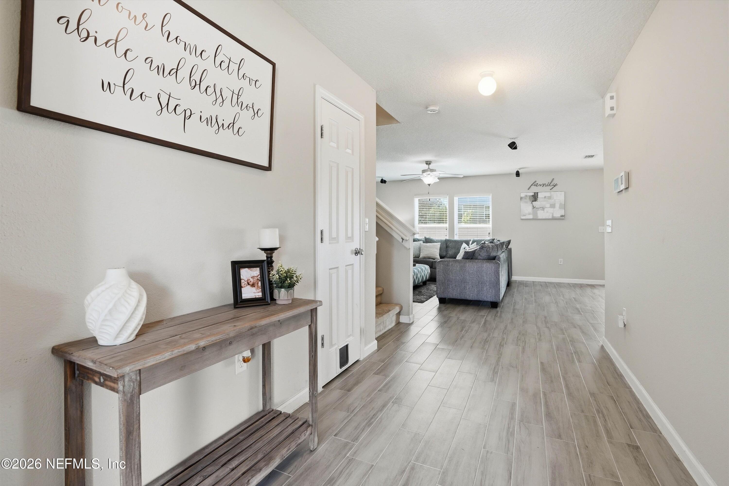 29 Auburn Oaks Road West Jacksonville, FL 32218 - Photo 2 of 38 a view of hallway with wooden floor