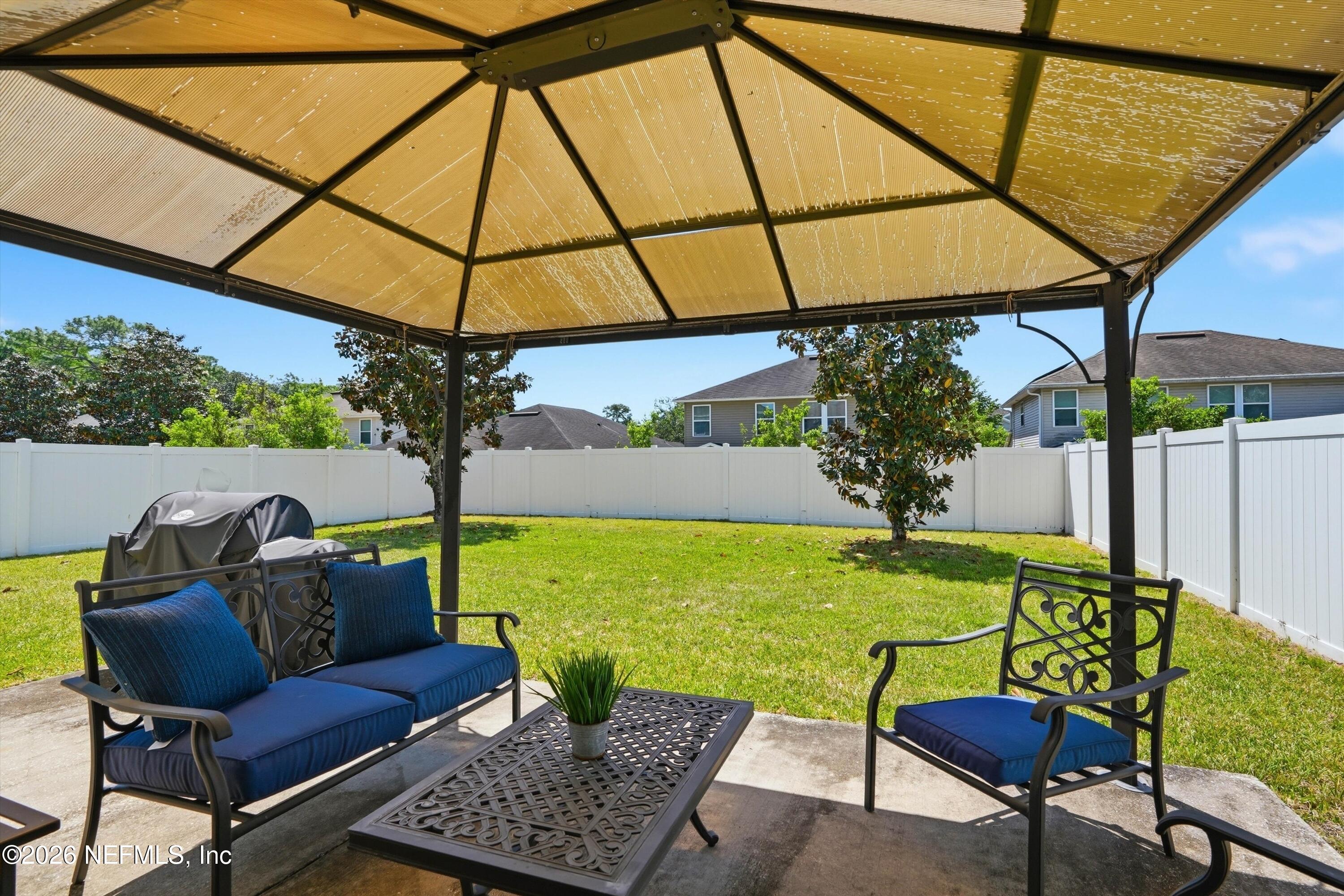 29 Auburn Oaks Road West Jacksonville, FL 32218 - Photo 27 of 38 a view of an outdoor sitting area with furniture