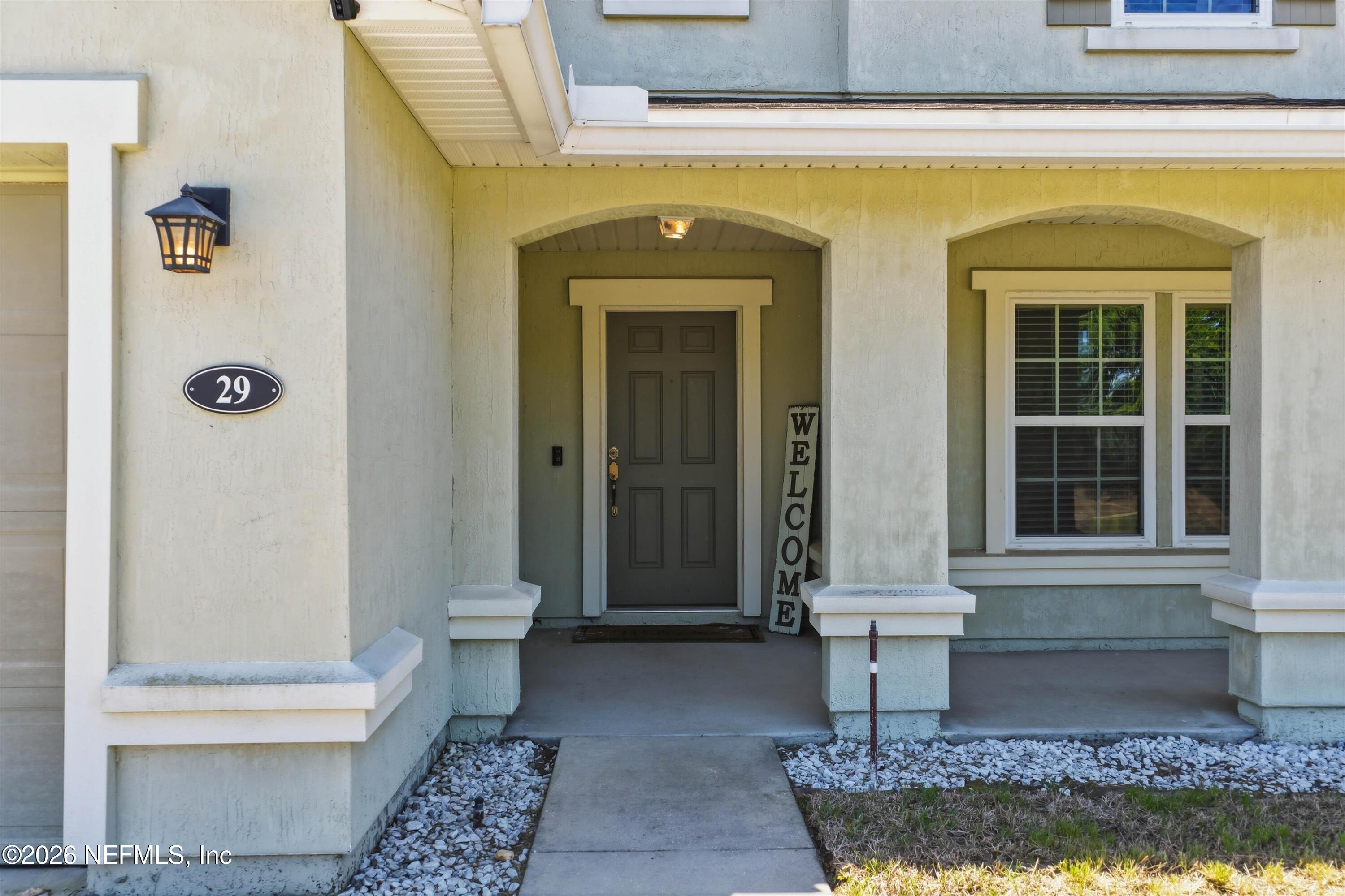 29 Auburn Oaks Road West Jacksonville, FL 32218 - Photo 29 of 38 a front view of a house with a rug