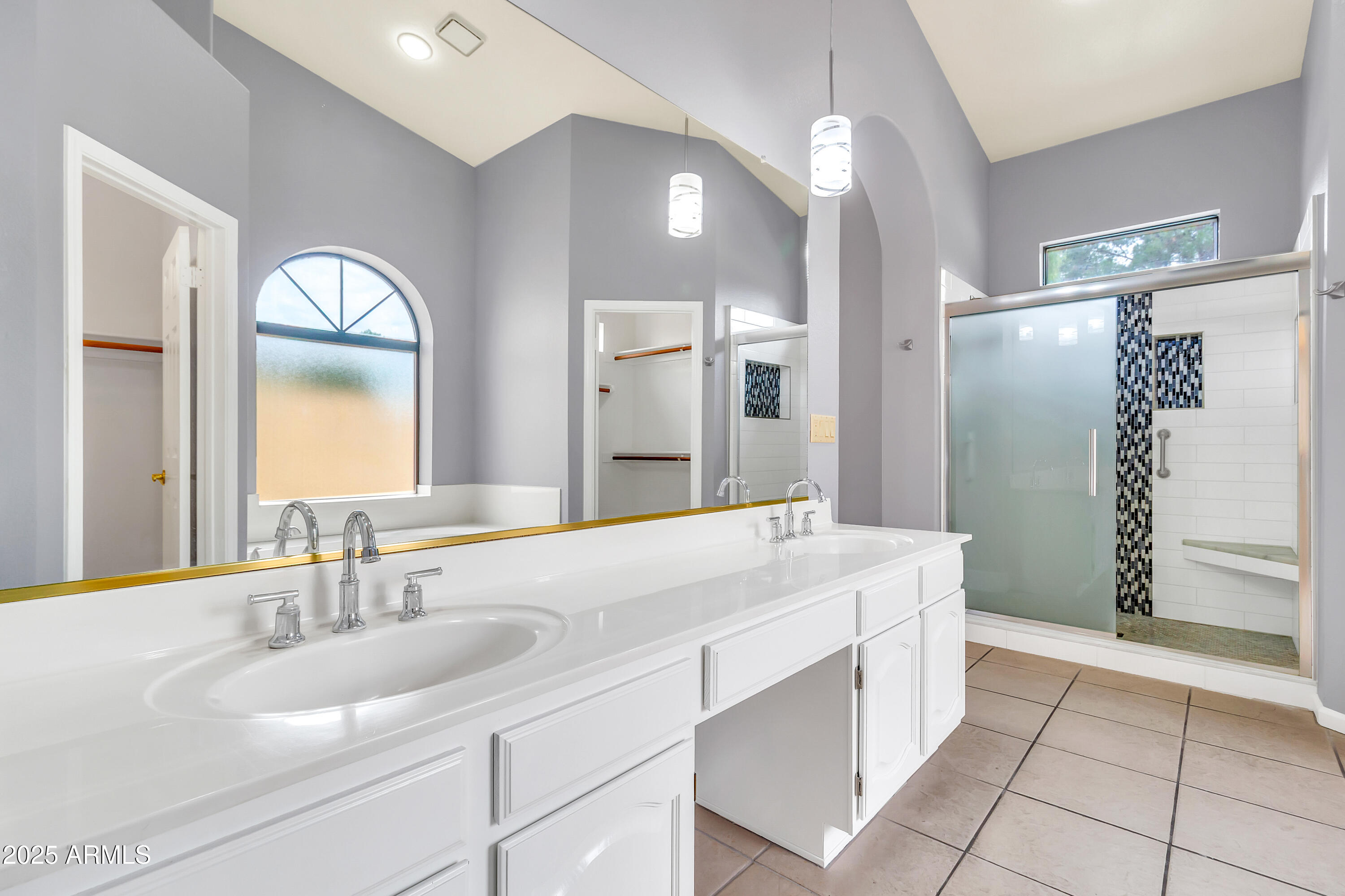205 East Stacey Lane Tempe, AZ 85284 - Photo 13 of 63 a bathroom with a sink and a mirror