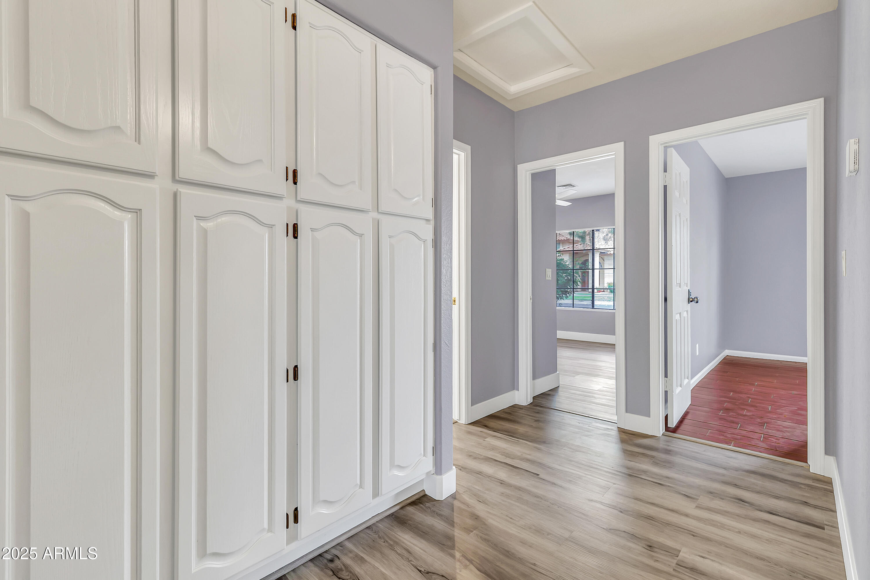 205 East Stacey Lane Tempe, AZ 85284 - Photo 29 of 63 a view of a hallway with wooden floor