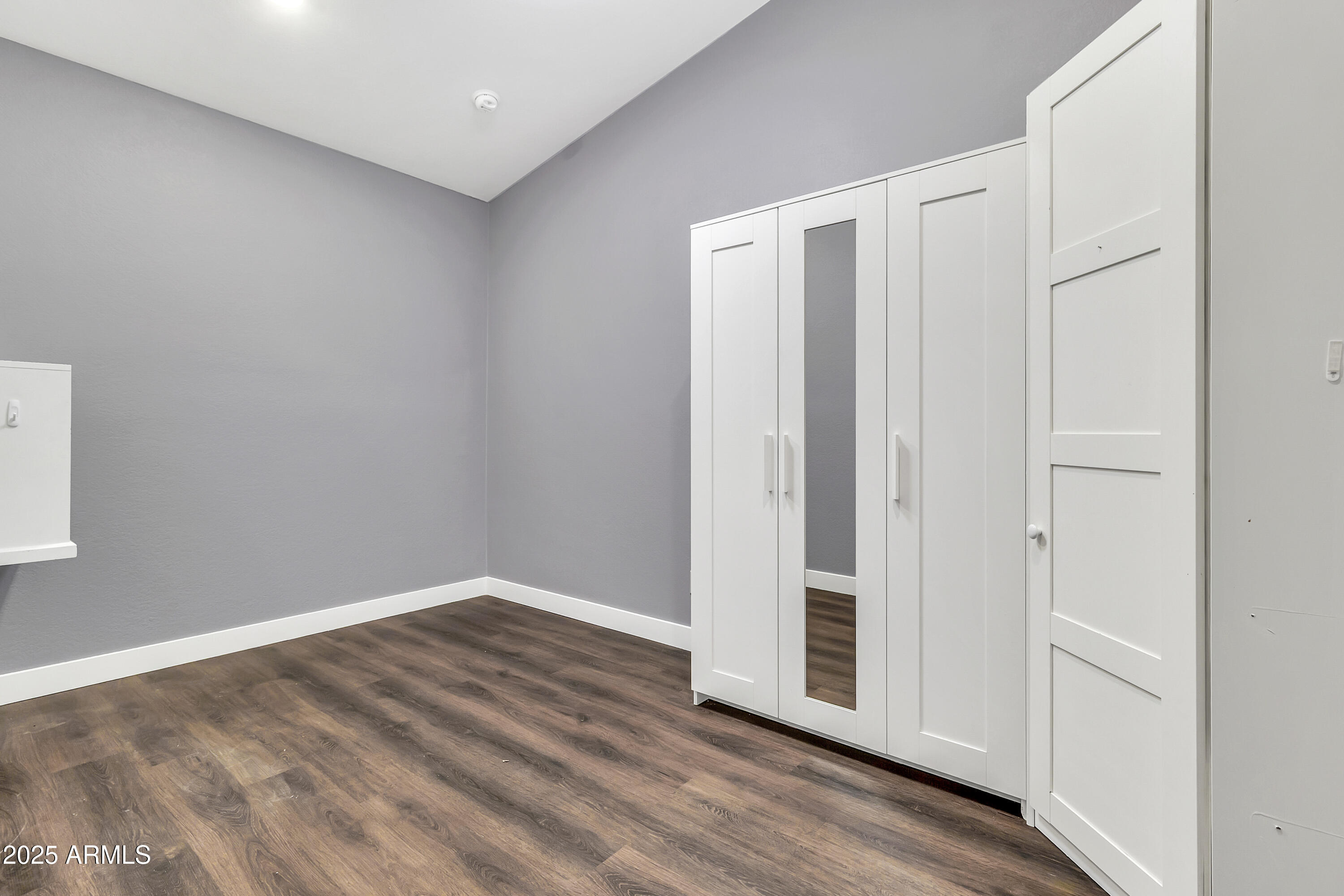 205 East Stacey Lane Tempe, AZ 85284 - Photo 31 of 63 a view of a livingroom with wooden floor