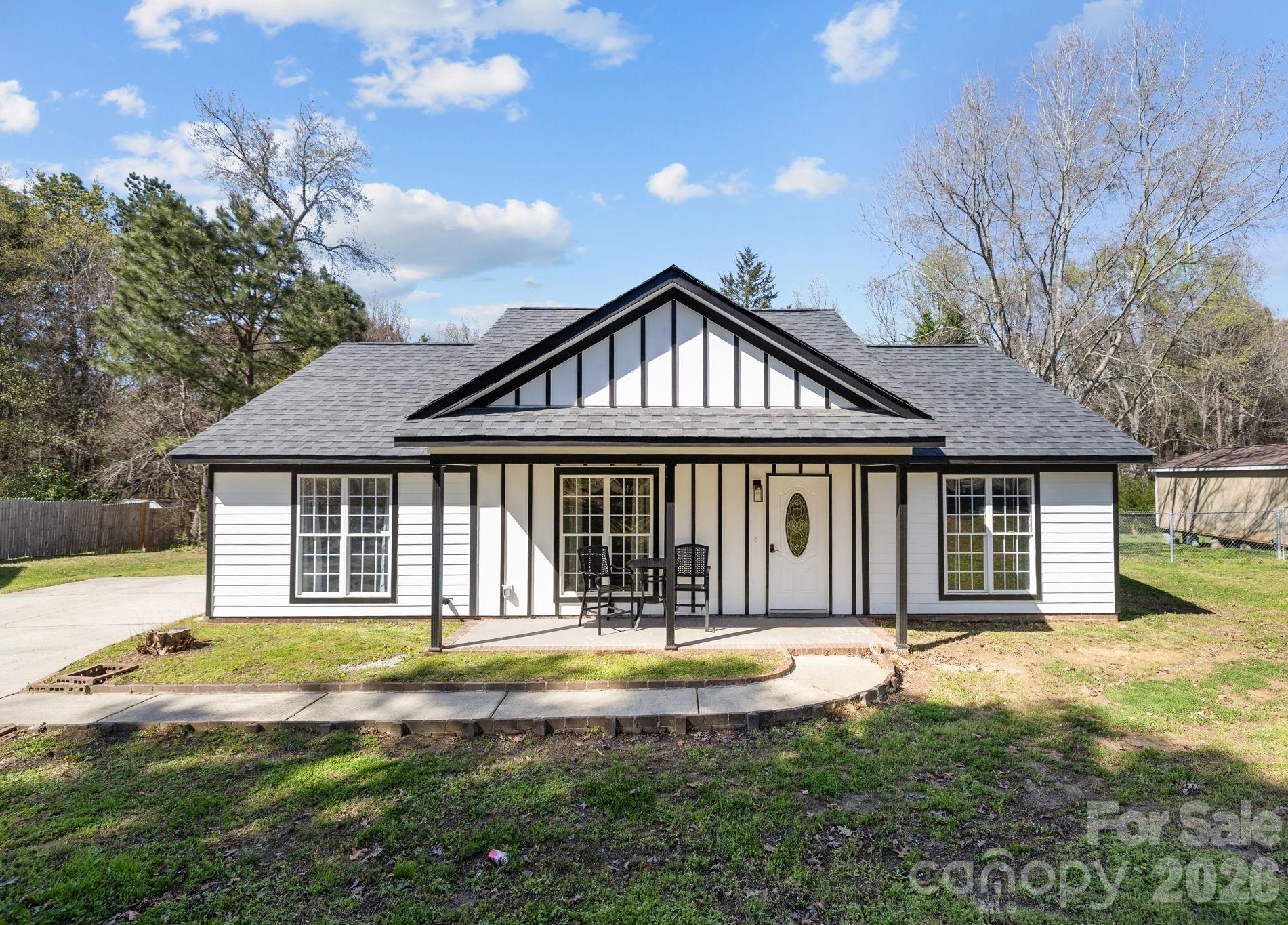 1012 Crescent Way Wingate, NC 28174 - Photo 1 of 20 a front view of a house with a yard