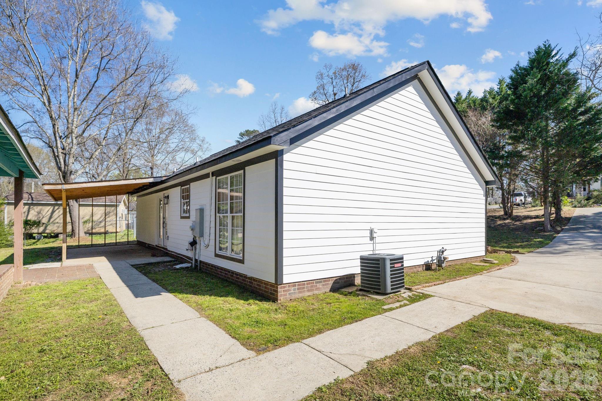 1012 Crescent Way Wingate, NC 28174 - Photo 15 of 20 a view of a house with a yard