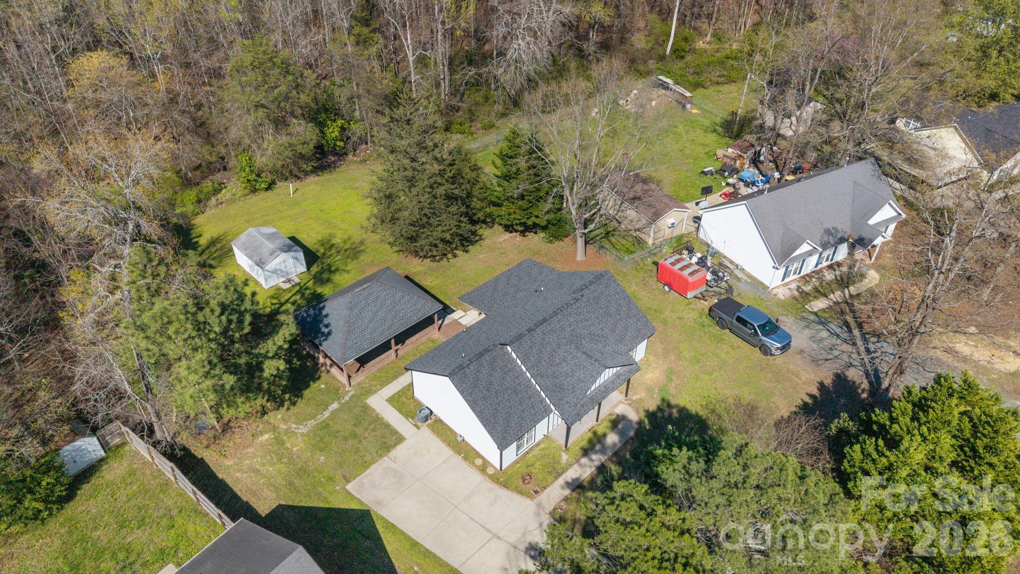 1012 Crescent Way Wingate, NC 28174 - Photo 19 of 20 an aerial view of a house with swimming pool and outdoor space