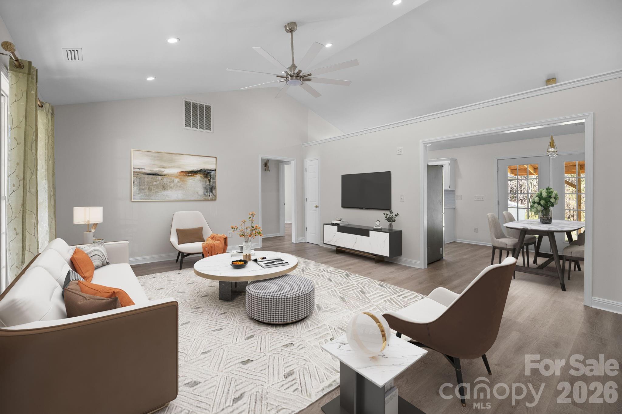 1012 Crescent Way Wingate, NC 28174 - Photo 2 of 20 a living room with furniture and a flat screen tv