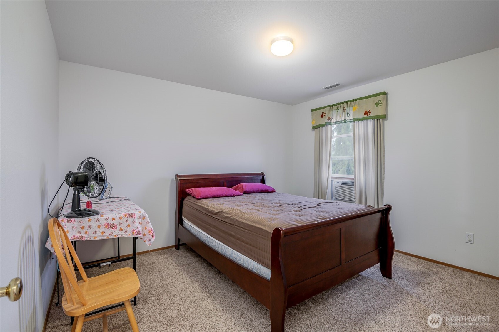 17008 Southeast 183rd Place Renton, WA 98058 - Photo 15 of 27 a bedroom with a bed and chair