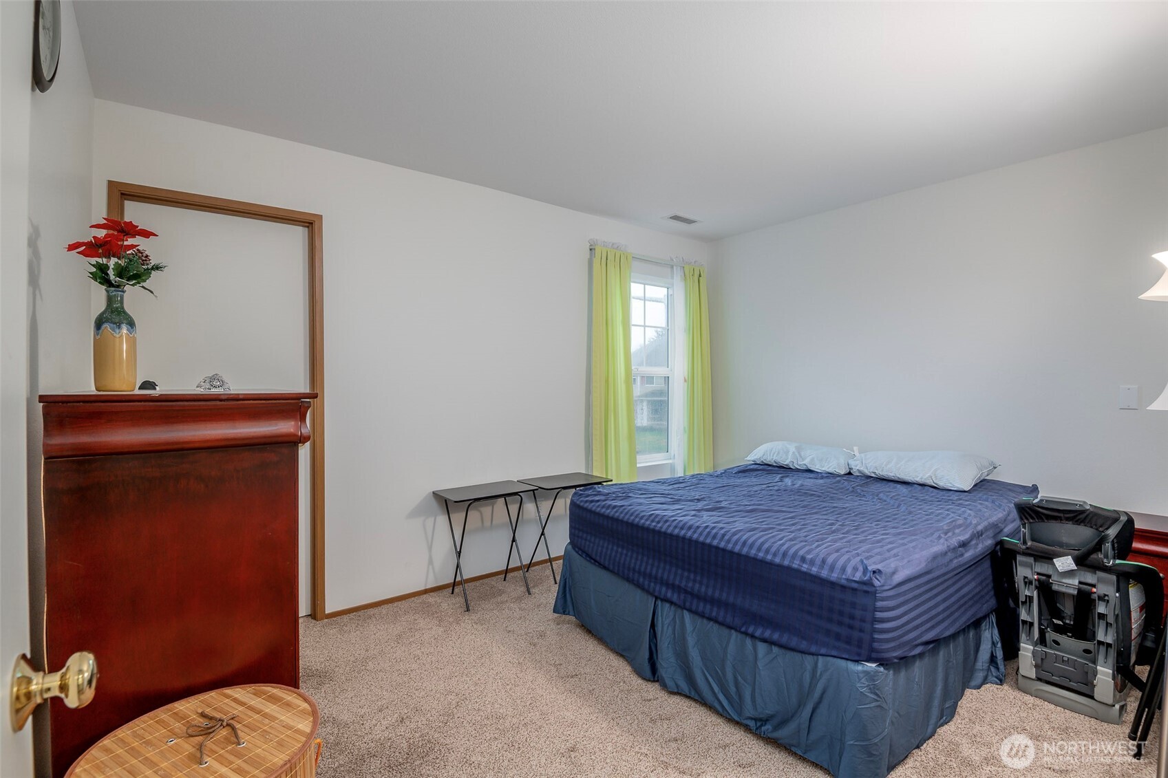 17008 Southeast 183rd Place Renton, WA 98058 - Photo 16 of 27 a bedroom with a bed and a dresser