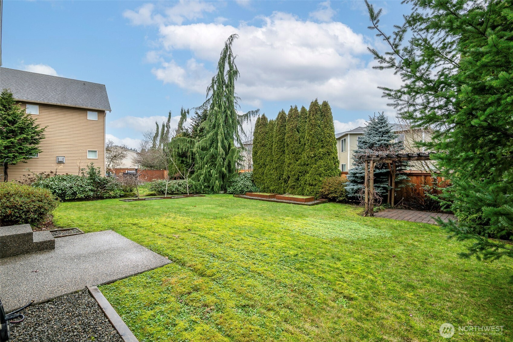 17008 Southeast 183rd Place Renton, WA 98058 - Photo 21 of 27 a backyard of a house with lots of green space