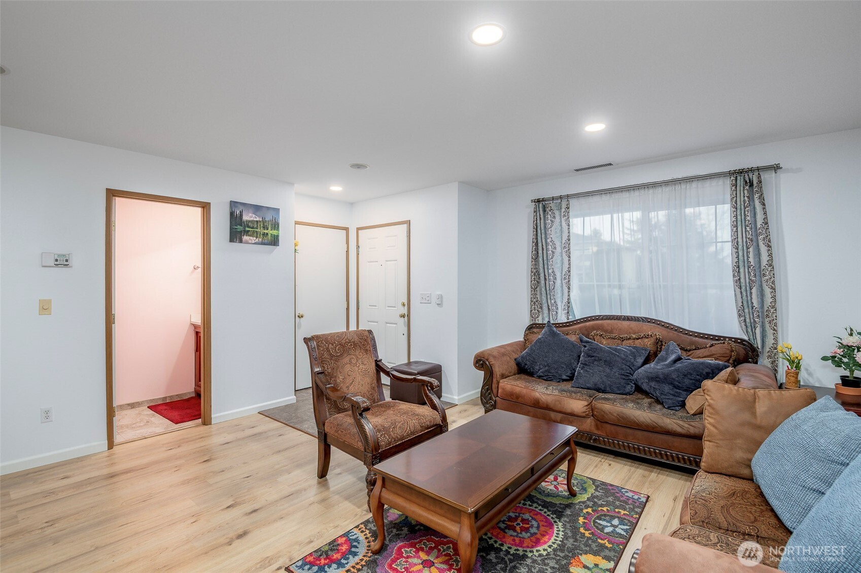 17008 Southeast 183rd Place Renton, WA 98058 - Photo 6 of 27 a living room with furniture and a window