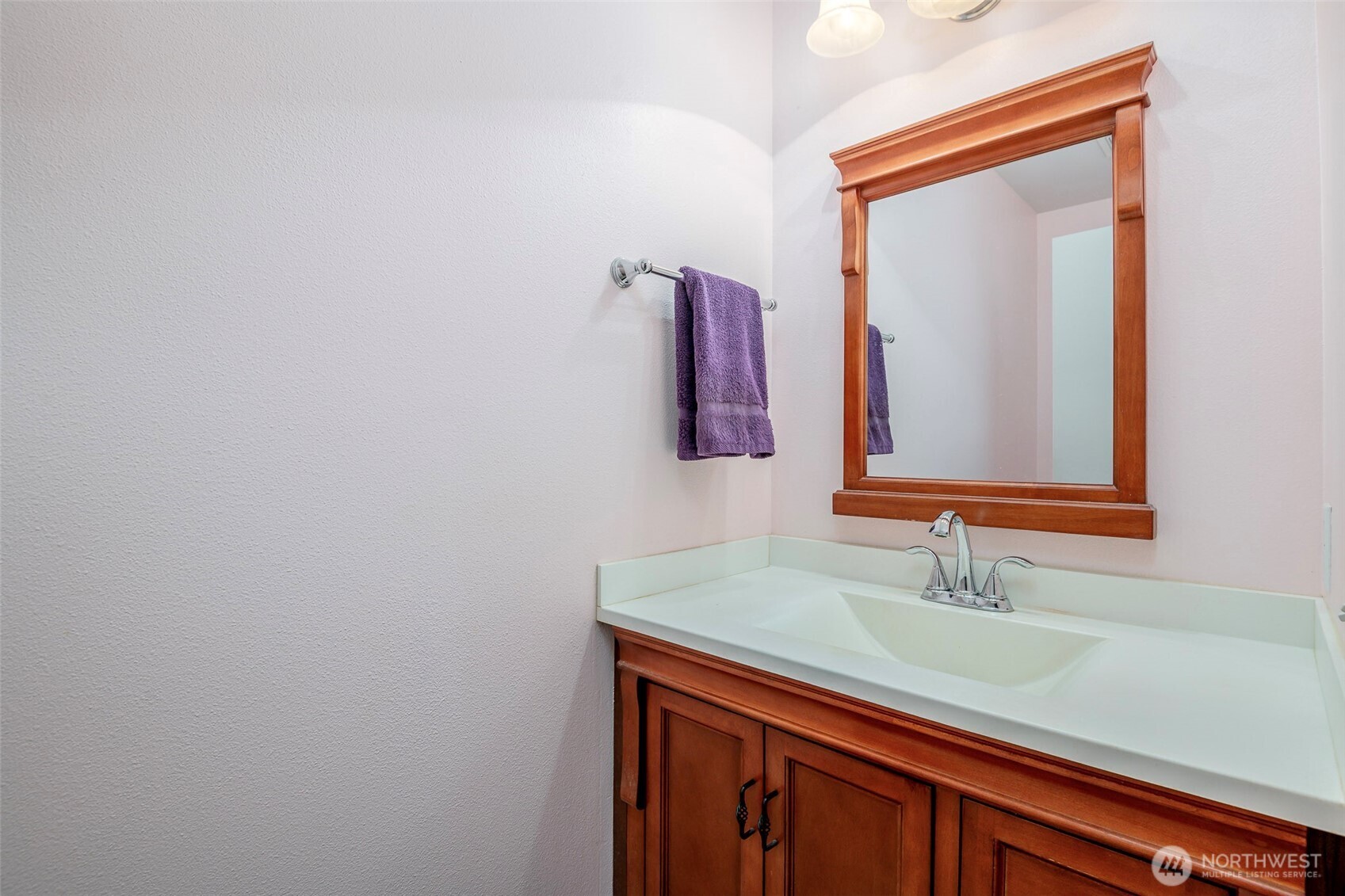 17008 Southeast 183rd Place Renton, WA 98058 - Photo 7 of 27 a bathroom with a sink and a mirror