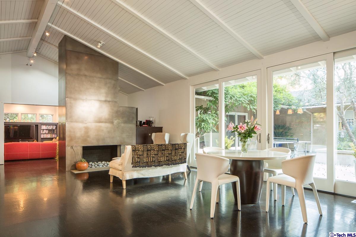 900 Hillcrest Place Pasadena, CA 91106 - Photo 15 of 40 a living room with fireplace furniture and a large window