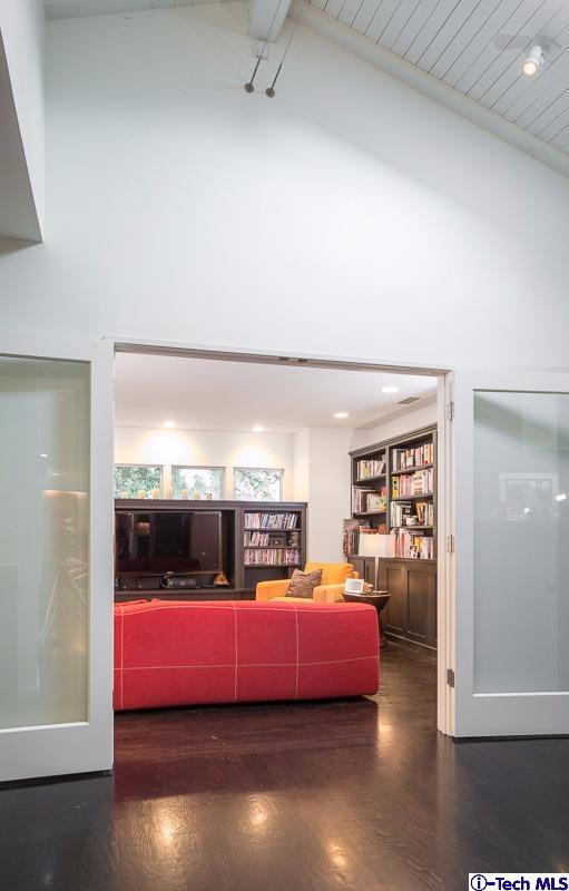 900 Hillcrest Place Pasadena, CA 91106 - Photo 16 of 40 a bedroom with furniture and wooden floor