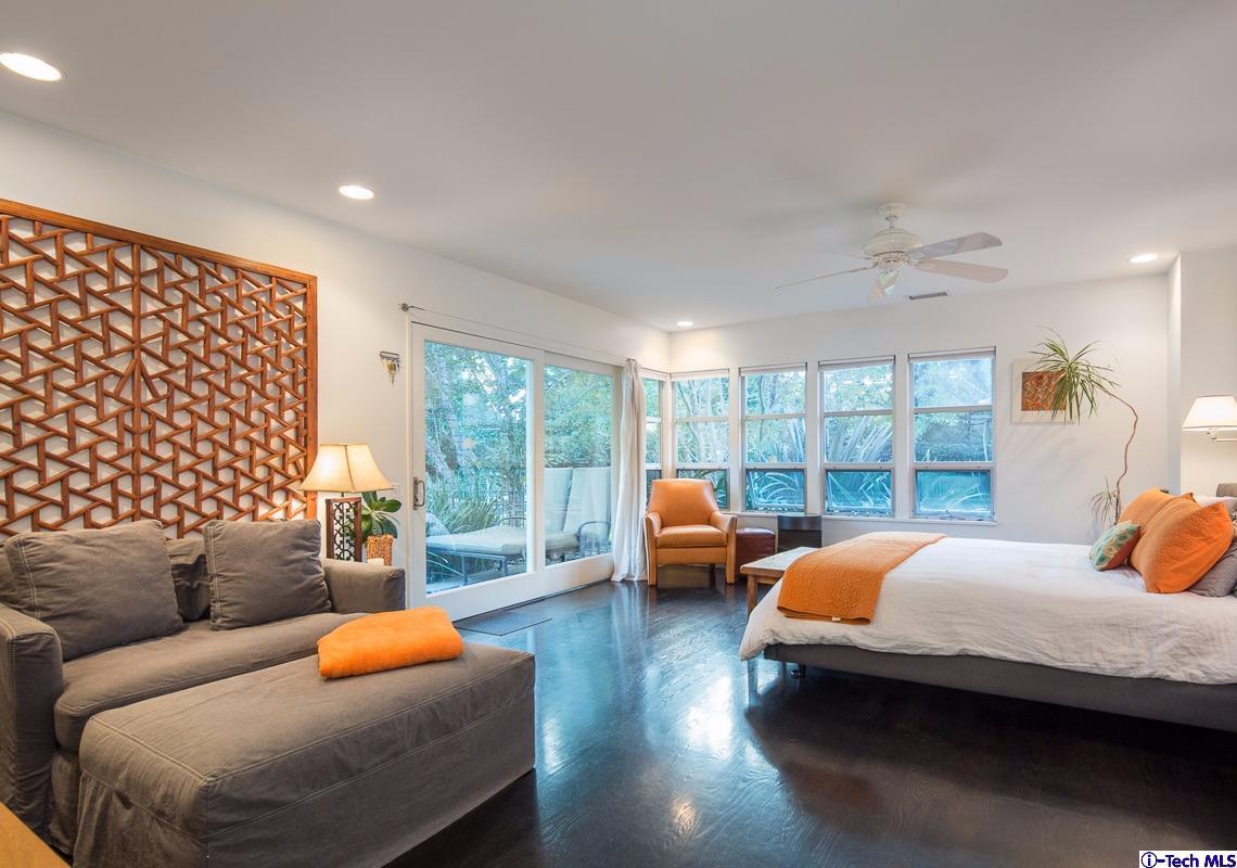 900 Hillcrest Place Pasadena, CA 91106 - Photo 24 of 40 a bedroom with furniture and large windows