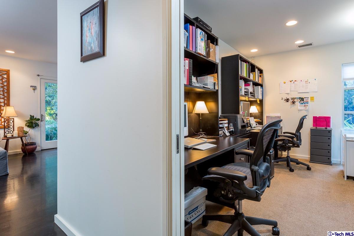 900 Hillcrest Place Pasadena, CA 91106 - Photo 25 of 40 a workspace with furniture and hardwood floor