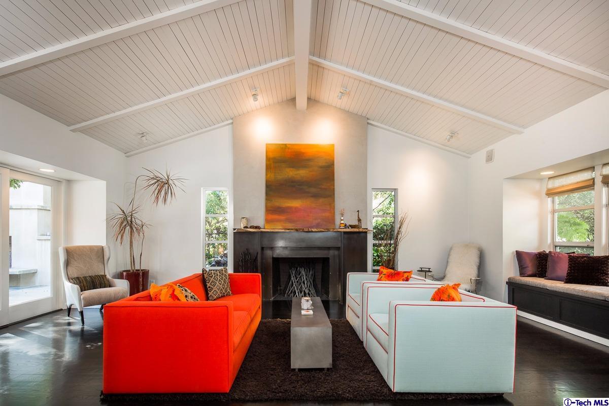 900 Hillcrest Place Pasadena, CA 91106 - Photo 4 of 40 a living room with furniture and a fireplace